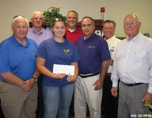 Cullman County Fair Association presents check to calf project recipients Jim Howard