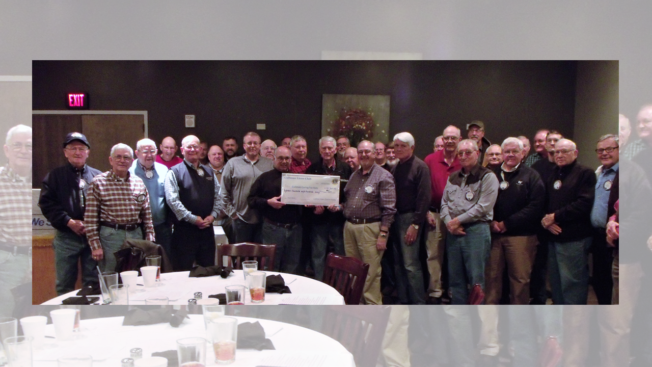 Cullman Lions present check for almost $19K to Cullman Caring for Kids Heather Mann