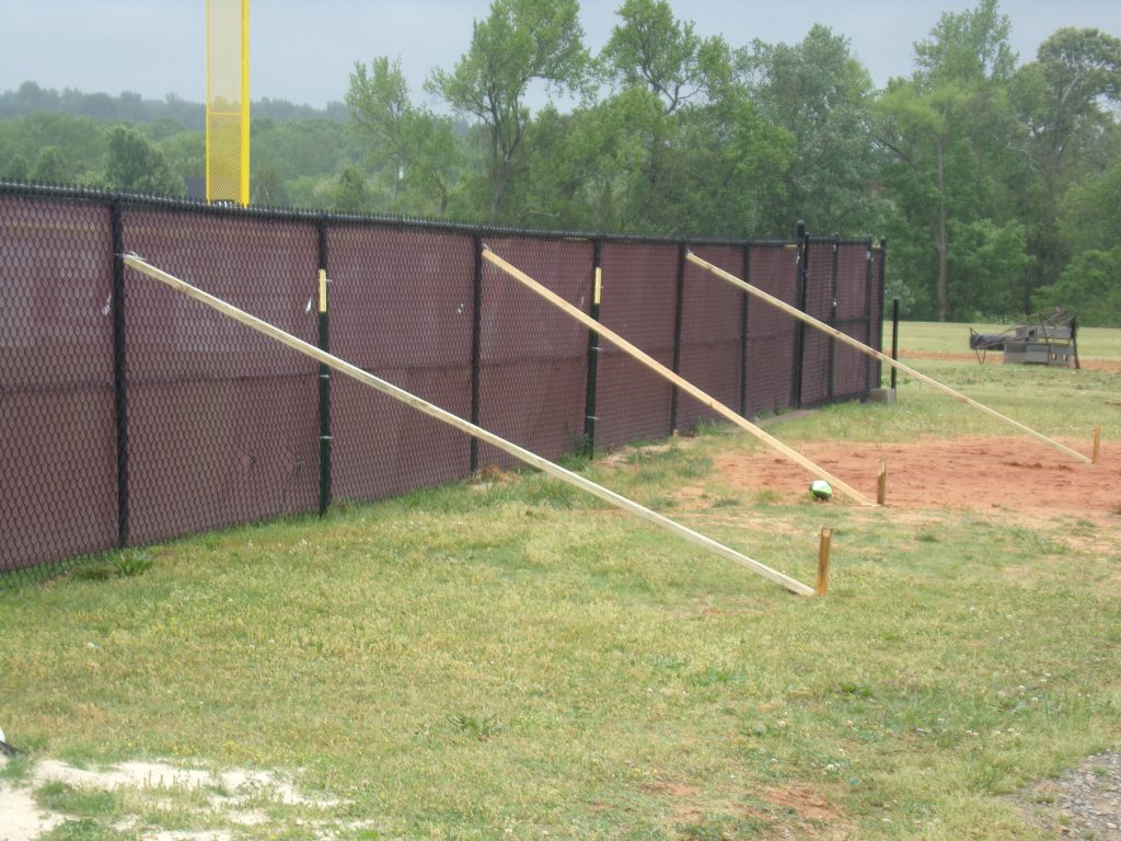 Team effort to repair stormdamaged West Point softball field fence