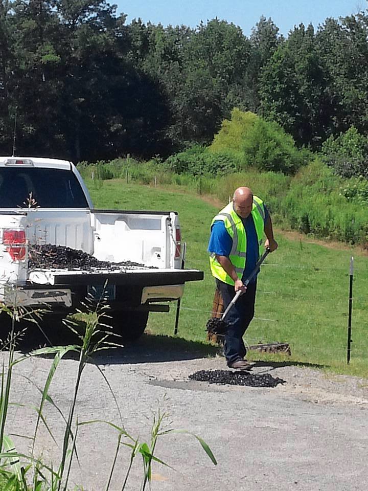 Walking the talk: Commissioner Garry Marchman takes road repair into his own hands
