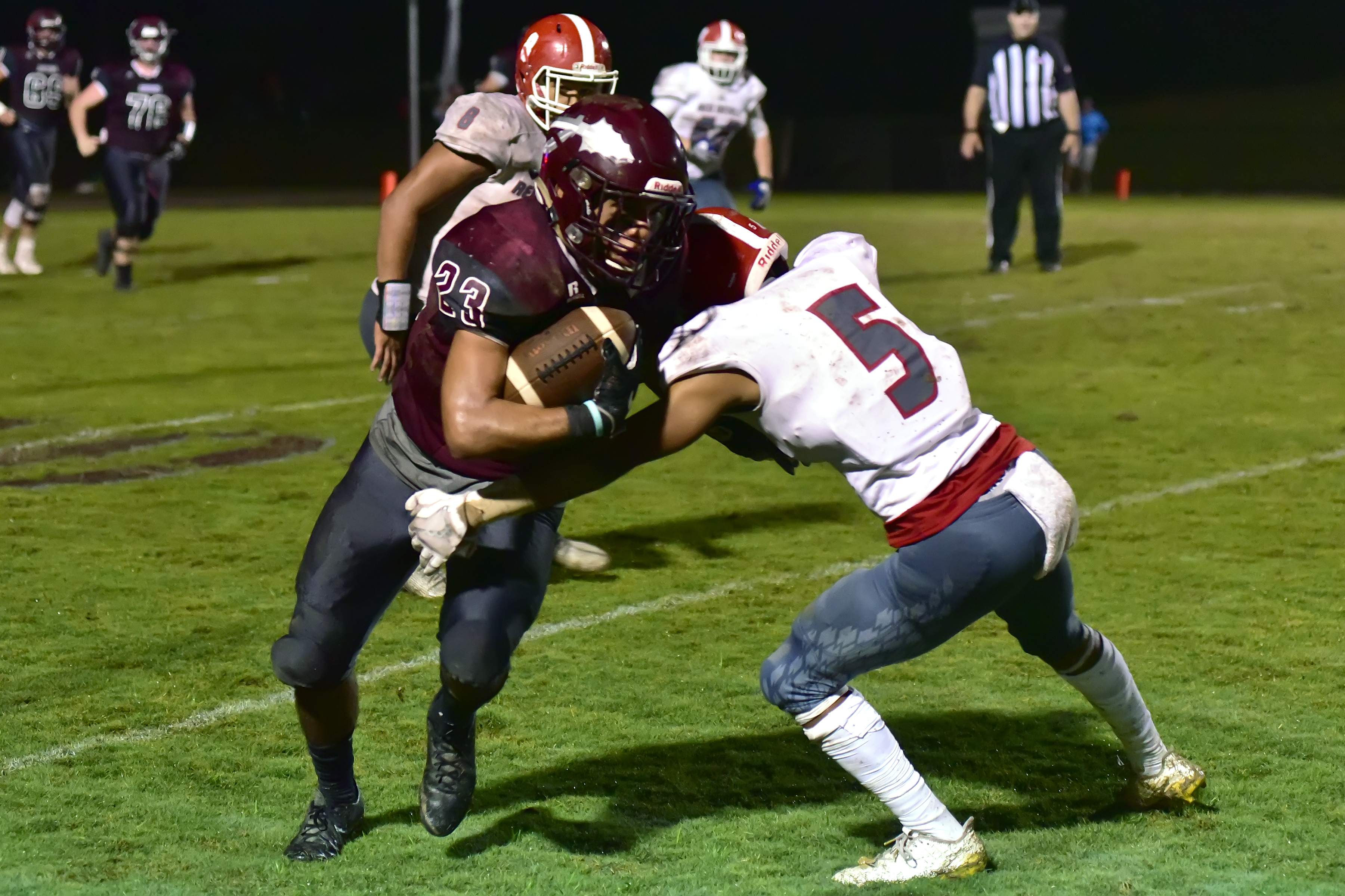 Warriors come up short against Red Devils, 28-20