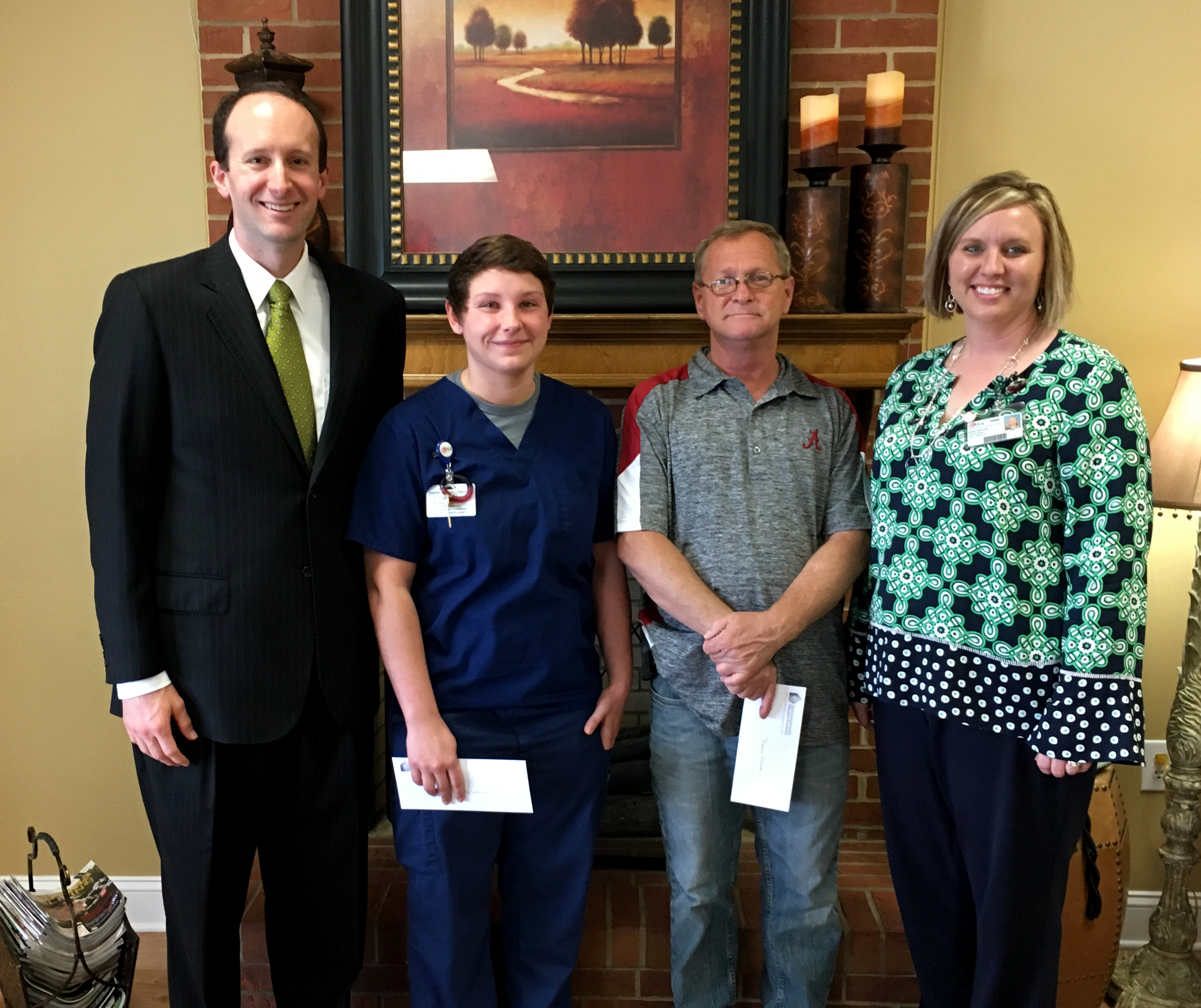 4 Woodland Village employees receive disaster assistance from ANHA 1.jpg
