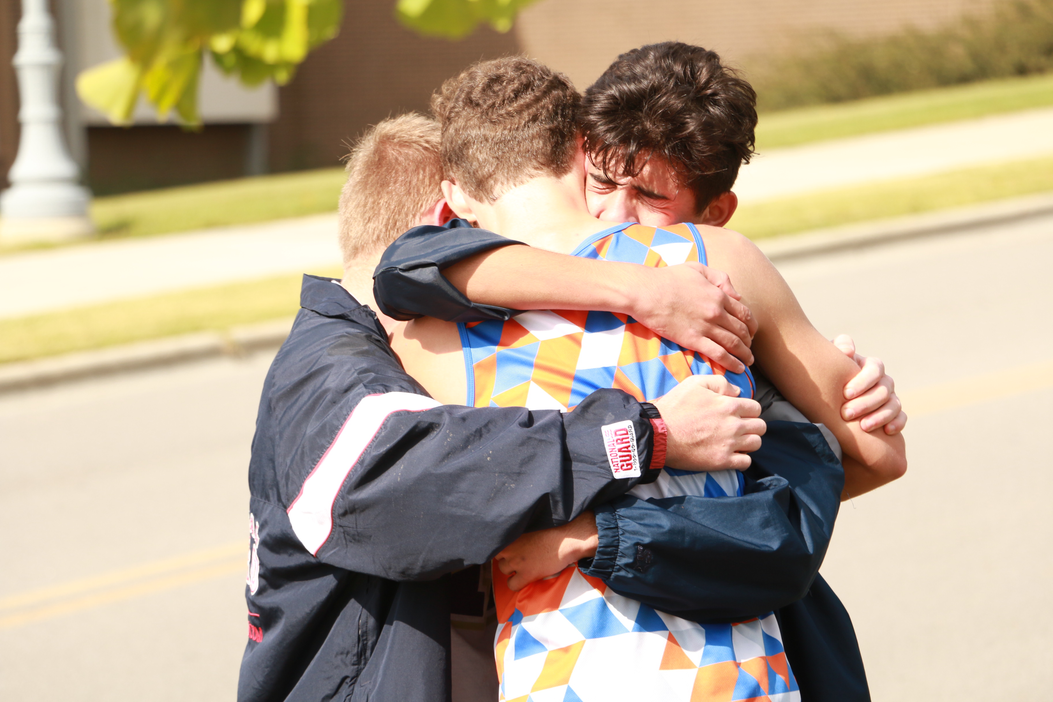 Wallace State cross country teams each win ACCC championship; Tanner King named Runner of the Year hamza-abusammour-shares-hug.jpg