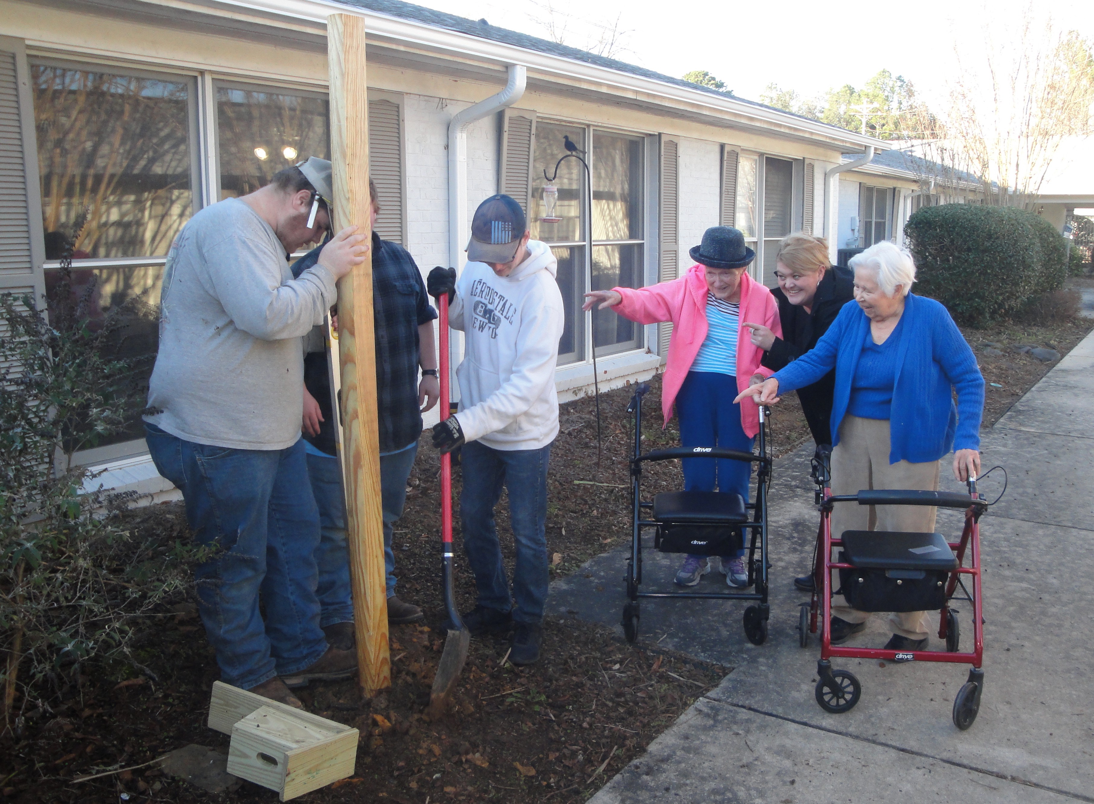CATA construction students install birdhouses at Woodland Haus dsc03039.jpg