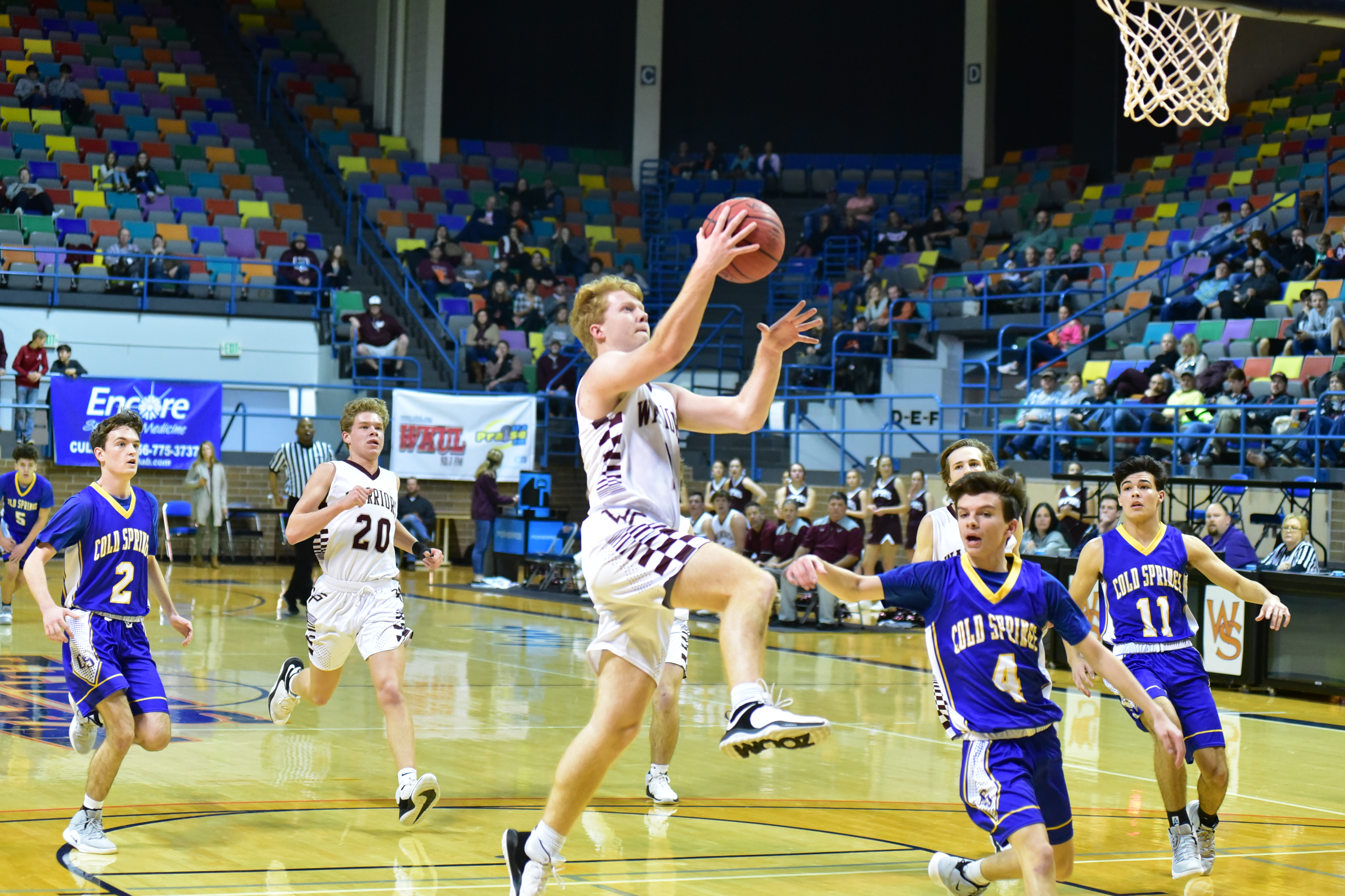 PREP BASKETBALL: Warriors hold off Eagles comeback to advance to semi-final round