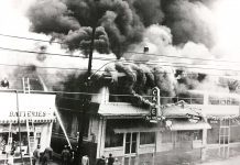 85 years in, Bennett family still a staple of Cullman business In 1962, the businesses next to Bennett Auto Supply caught fire and burned down. The fire began in what was once the theater and destroyed the block, including the original All Steak Cafe. The alley, which still exists on the south side of Bennett, kept the fire from spreading. This photo shows a young Doug Bennett on the roof of the building working to prevent the fire from spreading as the fire department fought the blaze. (Bennett family)