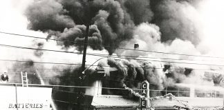 85 years in, Bennett family still a staple of Cullman business In 1962, the businesses next to Bennett Auto Supply caught fire and burned down. The fire began in what was once the theater and destroyed the block, including the original All Steak Cafe. The alley, which still exists on the south side of Bennett, kept the fire from spreading. This photo shows a young Doug Bennett on the roof of the building working to prevent the fire from spreading as the fire department fought the blaze. (Bennett family)