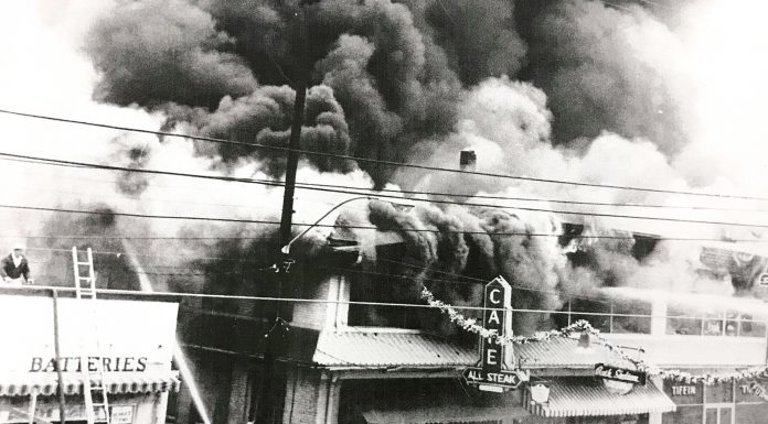 85 years in, Bennett family still a staple of Cullman business In 1962, the businesses next to Bennett Auto Supply caught fire and burned down. The fire began in what was once the theater and destroyed the block, including the original All Steak Cafe. The alley, which still exists on the south side of Bennett, kept the fire from spreading. This photo shows a young Doug Bennett on the roof of the building working to prevent the fire from spreading as the fire department fought the blaze. (Bennett family)