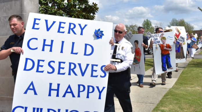 Stepping up: Prayer walk remembers children lost to abuse