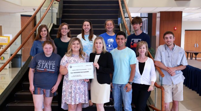 Wallace State’s Rotaract Club makes donation for ‘Tame the Hunger’ drive