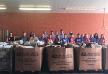 Letter carriers collect 10K pounds of food in annual food drive