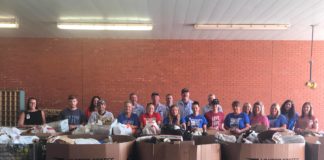 Letter carriers collect 10K pounds of food in annual food drive