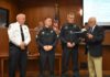 Cullman council honors police officers for promotions, years of service