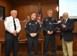 Cullman council honors police officers for promotions, years of service