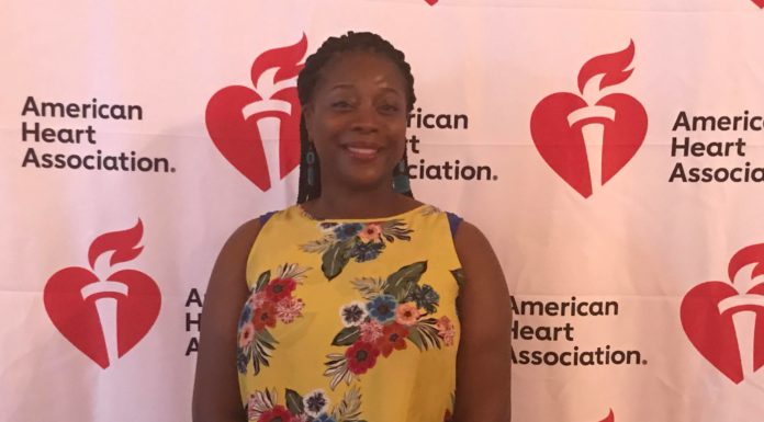 Heart transplant recipient Ovuke McCoy speaks at Heart Walk kick-off breakfast