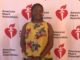 Heart transplant recipient Ovuke McCoy speaks at Heart Walk kick-off breakfast