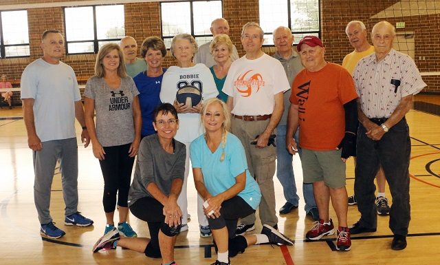 WSCC Wellness Center client surprised by volleyball teammates on 90th birthday