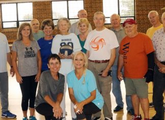 WSCC Wellness Center client surprised by volleyball teammates on 90th birthday