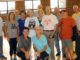 WSCC Wellness Center client surprised by volleyball teammates on 90th birthday