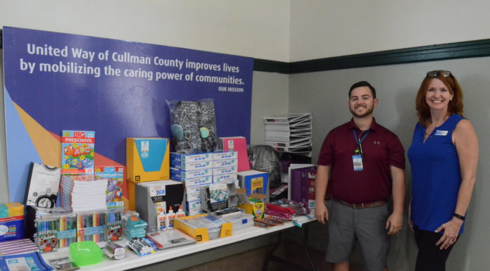 Wal-Mart Distribution gives large donation to United Way’s ‘Stuff the Bus’ school supply drive