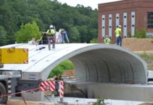 Parts of the new Eva Road Bridge coming together