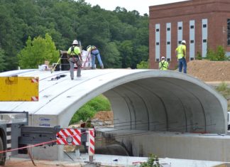 Parts of the new Eva Road Bridge coming together