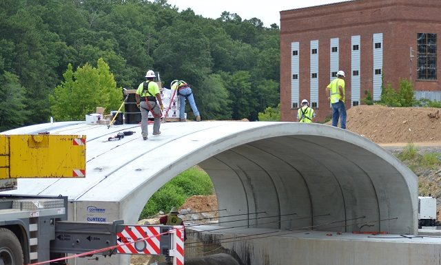 Parts of the new Eva Road Bridge coming together