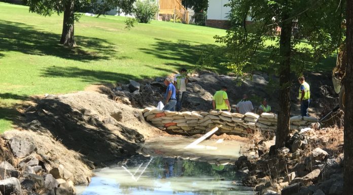 (Update) City dams Ryan Creek in Carroll Acres following fire at Professional Coatings