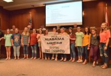 City signs off on access road project, recognizes local athletes