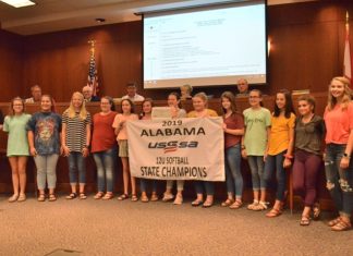 City signs off on access road project, recognizes local athletes