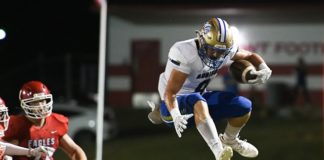 PREP FOOTBALL: Addison leaps past Vinemont on the road