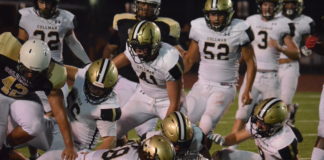 PREP FOOTBALL: Bearcats smother Columbia 48-0 on the road