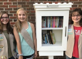 Leadership in action: Girl Scouts construct free library