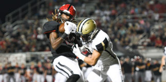 PREP FOOTBALL: 2nd-ranked Trojans handle Bearcats 45-0