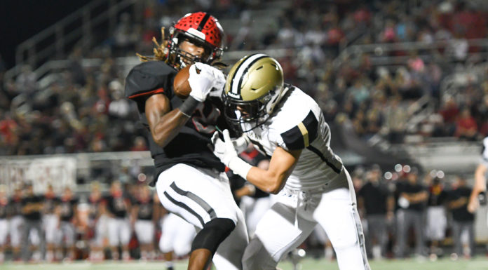 PREP FOOTBALL: 2nd-ranked Trojans handle Bearcats 45-0