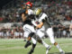 PREP FOOTBALL: 2nd-ranked Trojans handle Bearcats 45-0