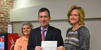 CCCDC presents 7 checks to local organizations, schools