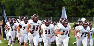 PREP FOOTBALL: Warriors edge Dora in 28-21 thriller