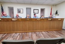 Garden City approves one-time bonus, meets township deputy