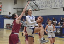 PREP BASKETBALL: Top-ranked Lady Eagles handle Phillips 78-52, Eagles thrash Bears 77-25