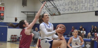 PREP BASKETBALL: Top-ranked Lady Eagles handle Phillips 78-52, Eagles thrash Bears 77-25