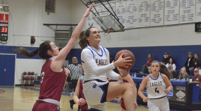 PREP BASKETBALL: Top-ranked Lady Eagles handle Phillips 78-52, Eagles thrash Bears 77-25