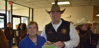 Dixie Dog Designs donates $2.2K to Sheriff’s Special Needs Rodeo