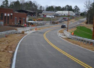 Back open! Eva Road bridge is complete; road open to traffic today