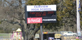Merrill: Signs regarding 1-cent tax improperly placed around schools