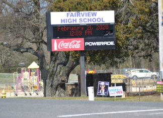 Merrill: Signs regarding 1-cent tax improperly placed around schools