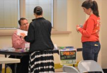 A mile in their shoes: CCPS faculty, staff participate in ‘poverty simulator’ to gain better understanding of students in need