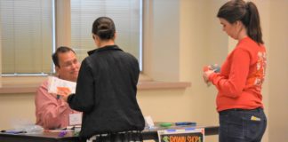 A mile in their shoes: CCPS faculty, staff participate in ‘poverty simulator’ to gain better understanding of students in need