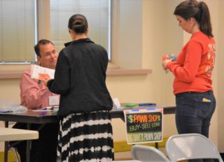 A mile in their shoes: CCPS faculty, staff participate in ‘poverty simulator’ to gain better understanding of students in need