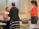 A mile in their shoes: CCPS faculty, staff participate in ‘poverty simulator’ to gain better understanding of students in need